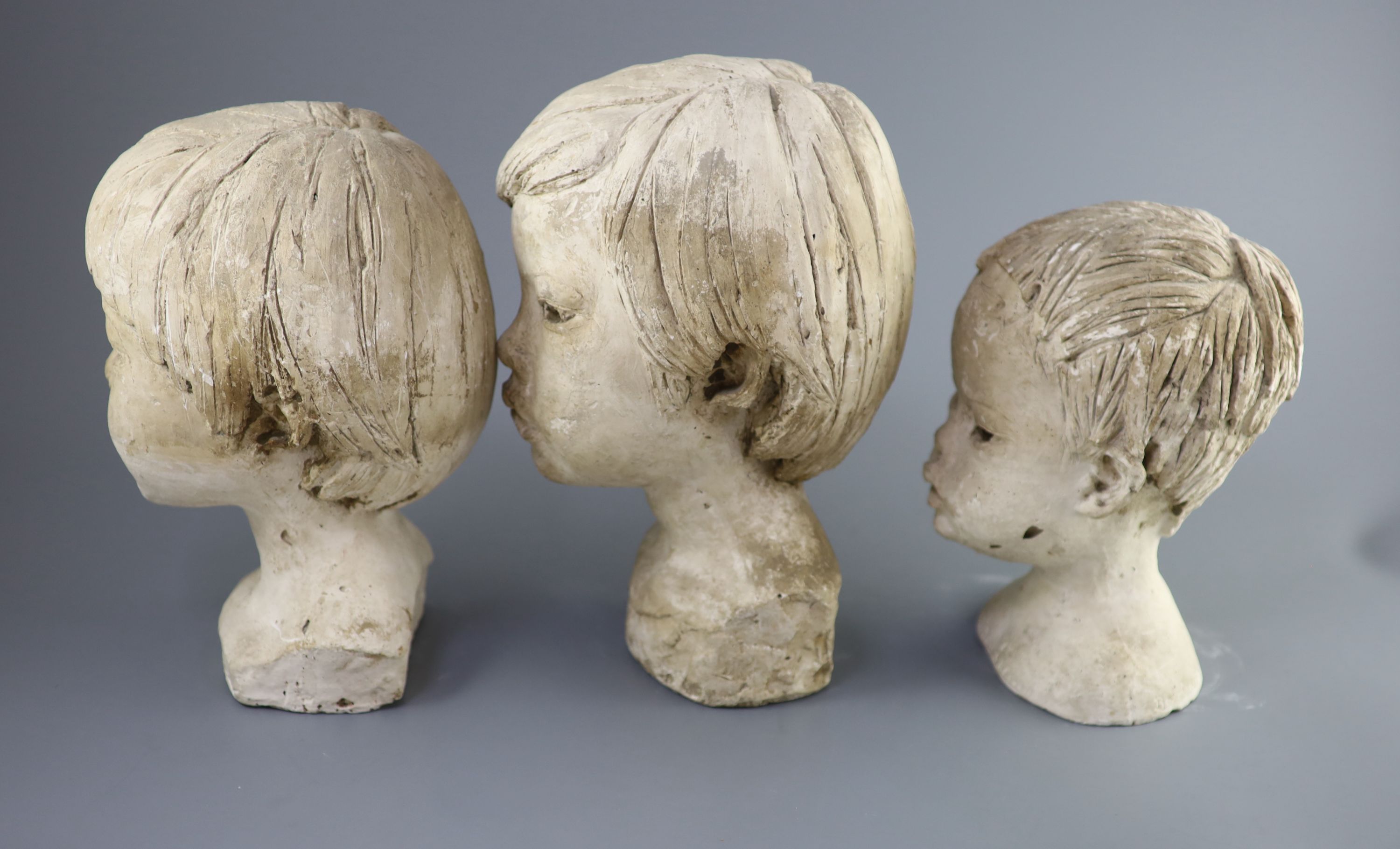 Barbara Tribe (1913-2000), , Three plaster head studies of children, largest 32cm